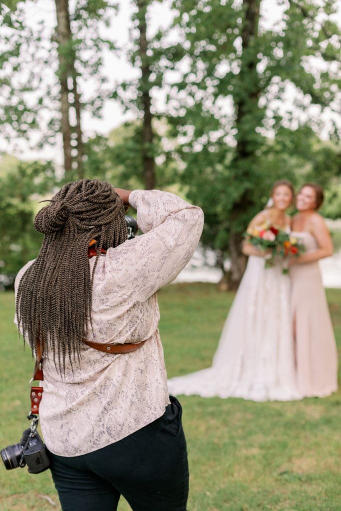 balancing personal life in branding and business marketing for photographers by sacia matthews, photographing bride and bridesmaid behind the scenes