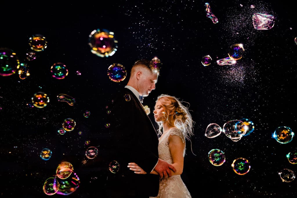 wedding couple dancing with bubbles inspired by photography concepts
